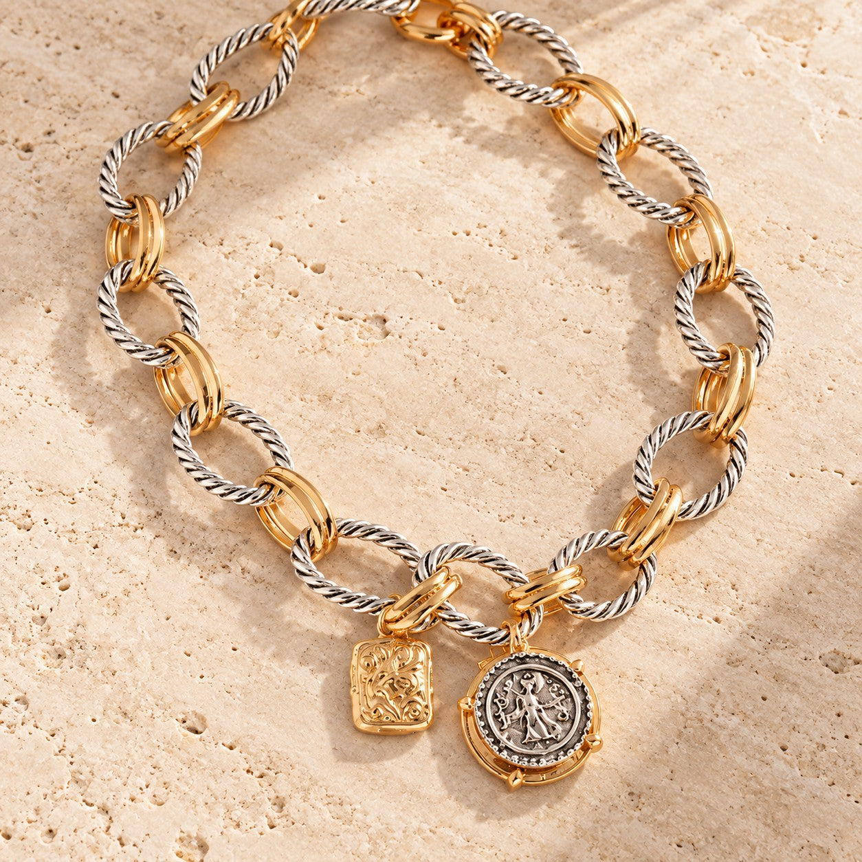 Signature dual-tone coin necklace detail